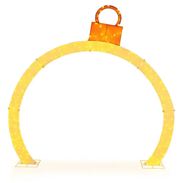 Lighted Christmas ornament archway at night