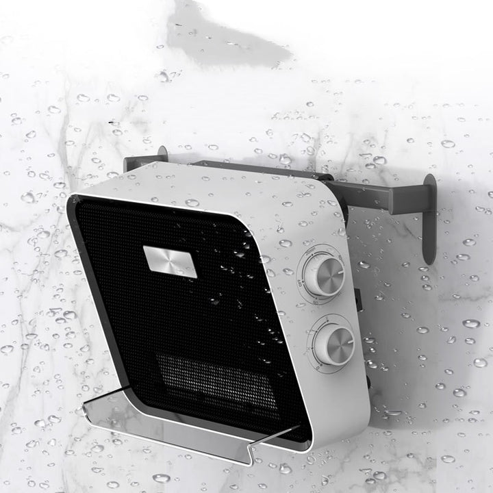 White wall-mounted fan heater in a tiled bathroom